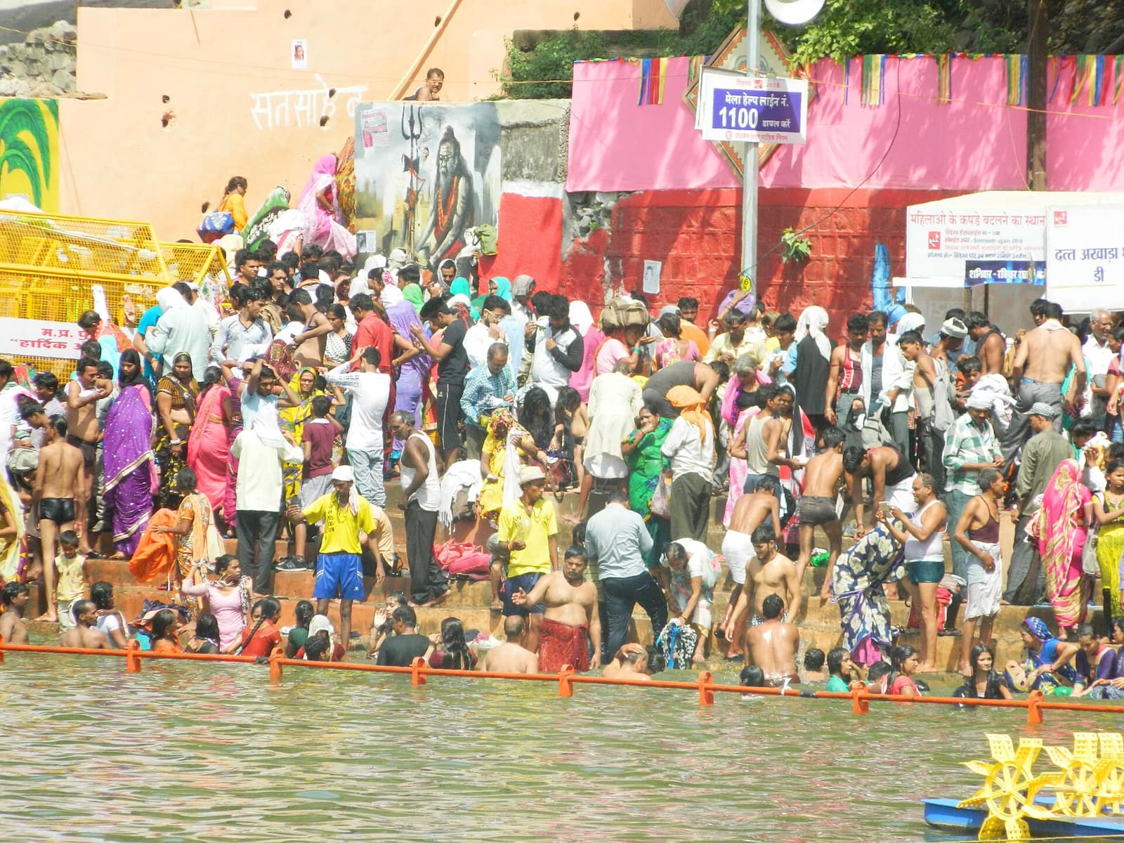 Devotees taking a holy dip in the Shipra river during the Simhasth Kumbh Mela in Ujjain
