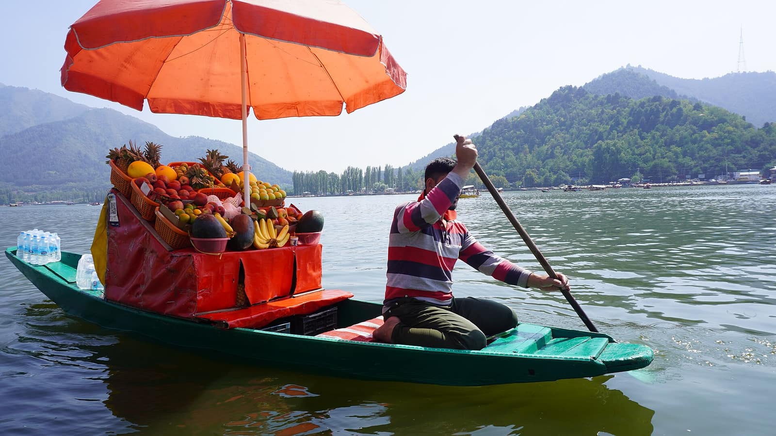 Shikara fruit boat on Dal Lake in Srinagar, Kashmir tour package from Indore